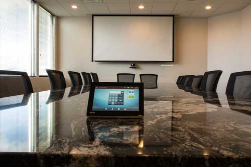 Empty Conference Room with Sound System on Conference Table | Marshall