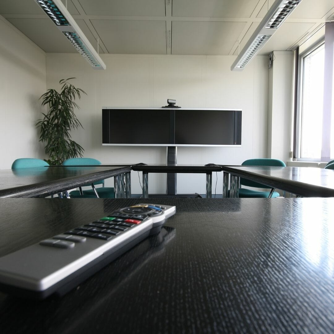 Remote control used in video conference room for smart controls
