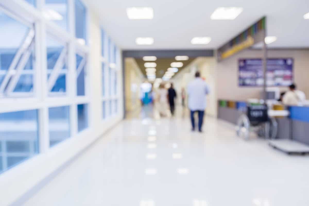 A blurred out image of a hospital. Sound systems are crucial for hospitals and clinics to ensure effective treatment of patients.