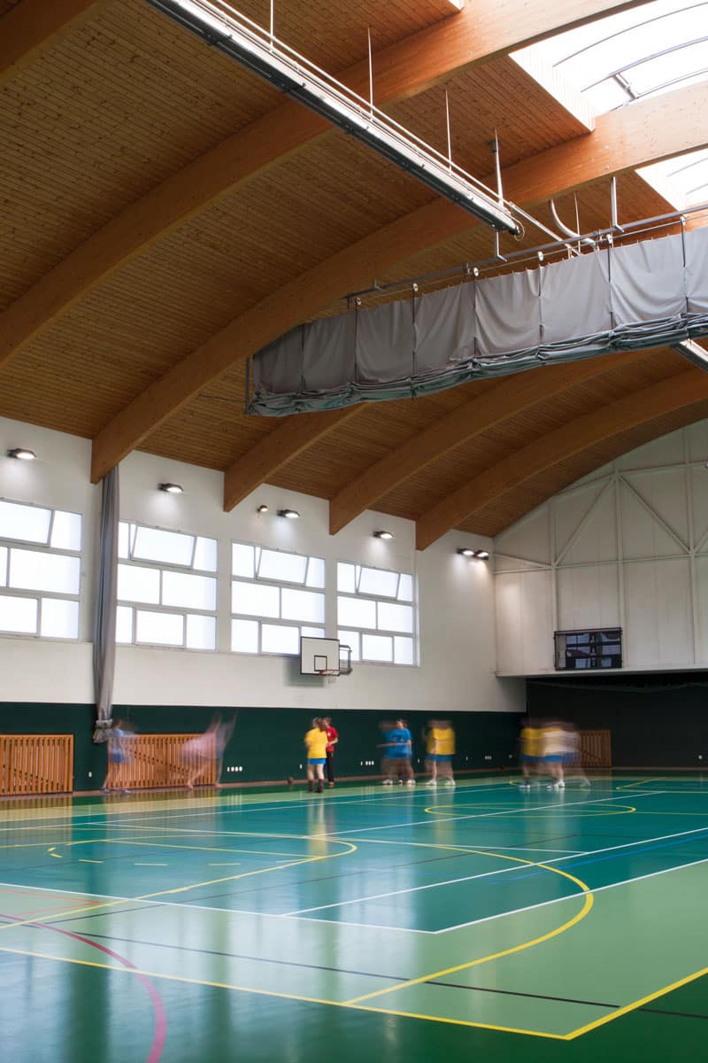 School gym AV system designed for high-noise, high-reverb environments like this.